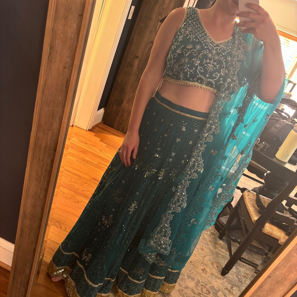 Teal Heavy Thread Embroidered Lehenga from Lashkaraa Size XL  worn once
